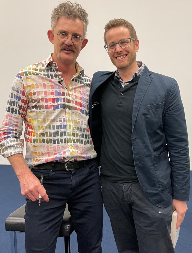Two colleagues at a professional event